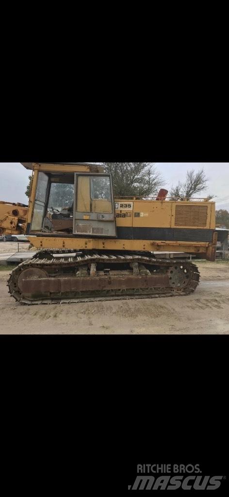 CAT 235 Pásové rýpadlá