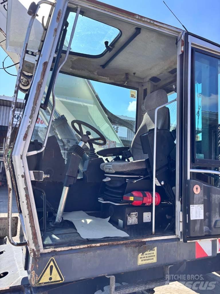 Fuchs MHL 320 Stroje pre manipuláciu s odpadom