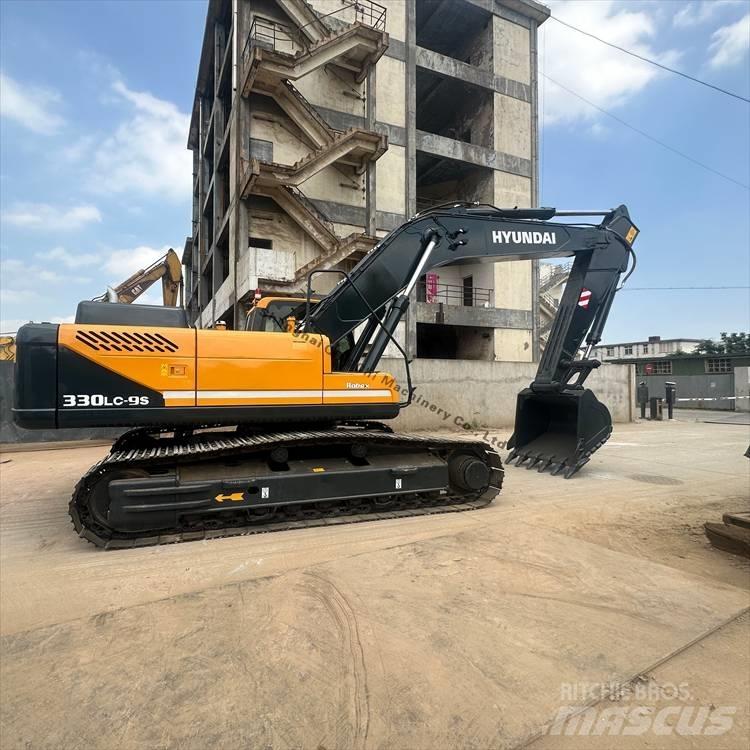 Hyundai 330 Pásové rýpadlá