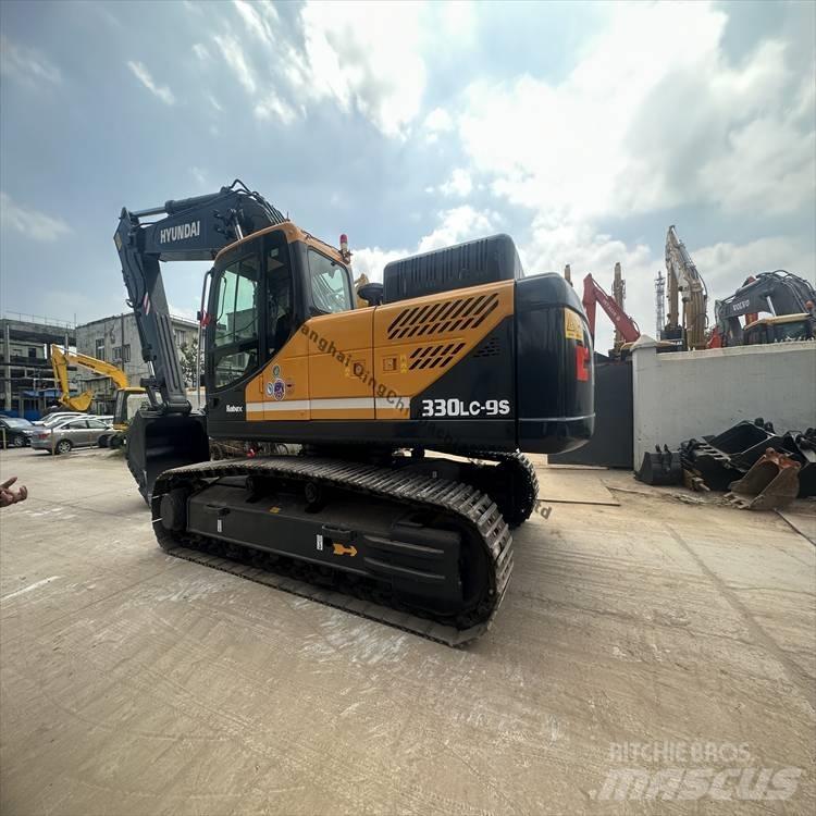 Hyundai 330 Pásové rýpadlá
