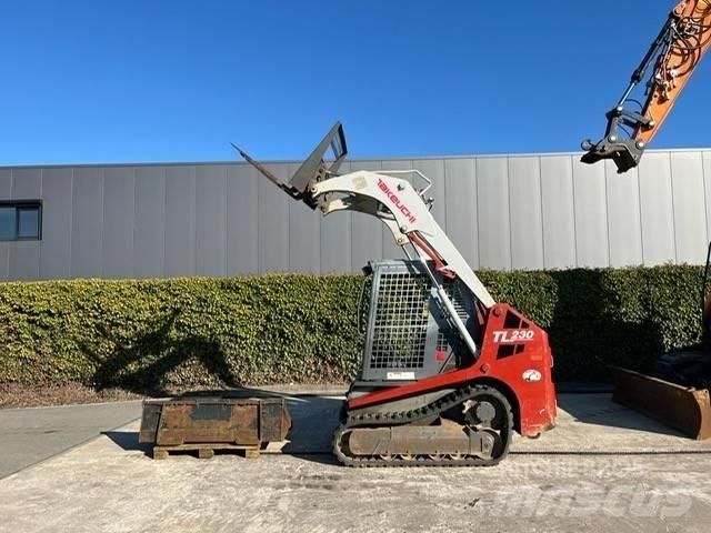 Takeuchi TL 230 Šmykom riadené nakladače