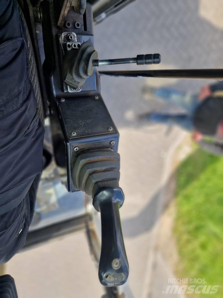 Fuchs MHL 331 Stroje pre manipuláciu s odpadom