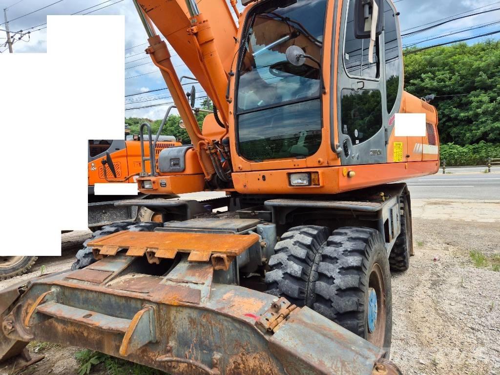Doosan DX210WA Kolesové rýpadlá