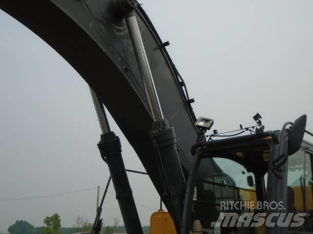 John Deere 450 DLC Pásové rýpadlá