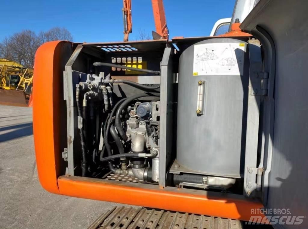 Hitachi EX 100 Pásové rýpadlá