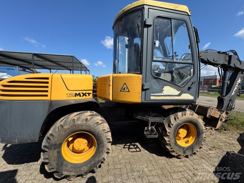 Mecalac 12 MXT Kolesové rýpadlá