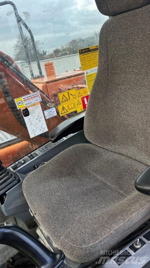 Doosan DX225 Kolesové rýpadlá