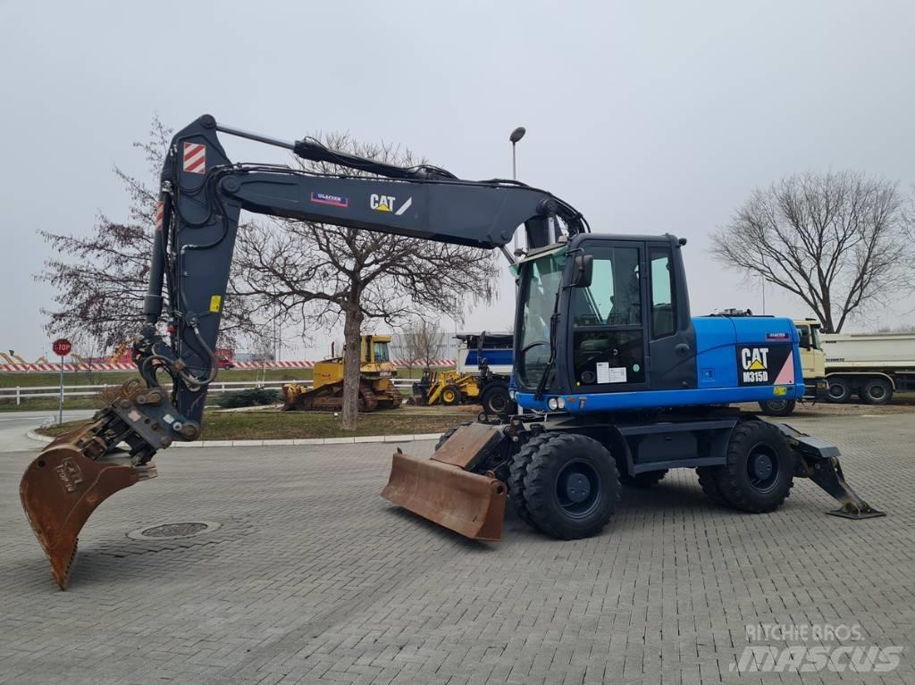 CAT M315D 2 buckets Kolesové rýpadlá