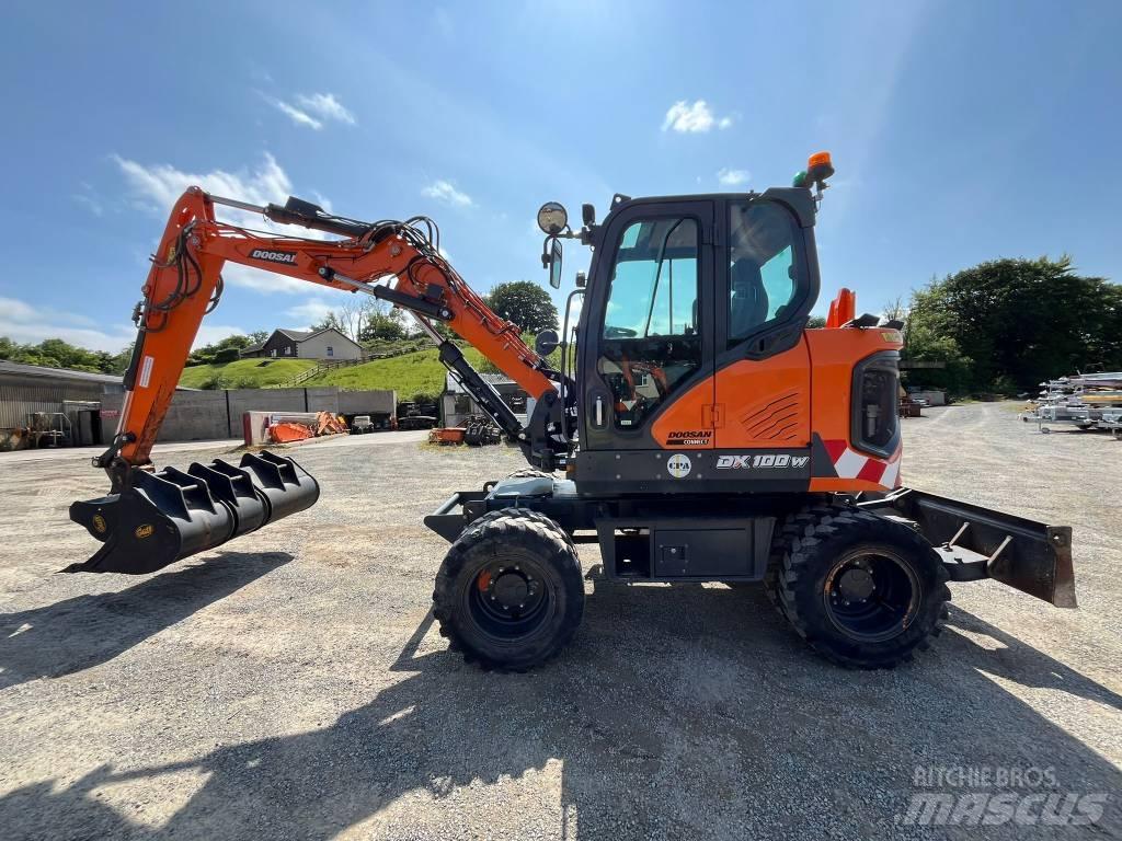 Develon DX 100 W-7 Kolesové rýpadlá