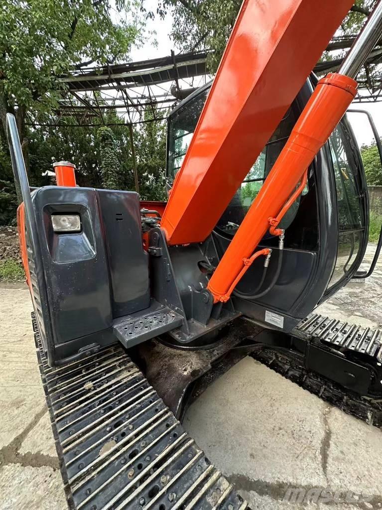 Hitachi 70 Pásové rýpadlá