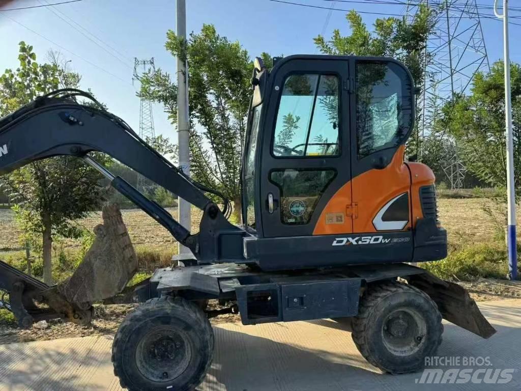 Doosan DX60W Kolesové rýpadlá