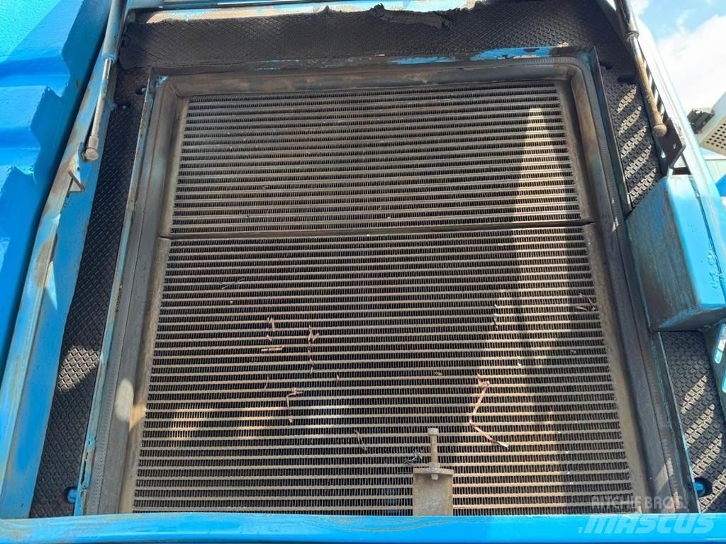 Fuchs MHL 350 Stroje pre manipuláciu s odpadom