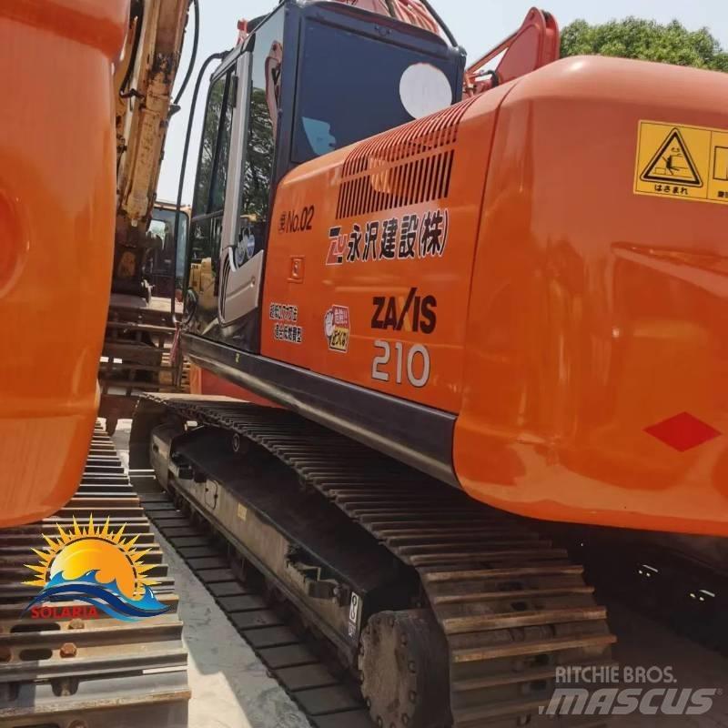 Hitachi ZX 210 Pásové rýpadlá