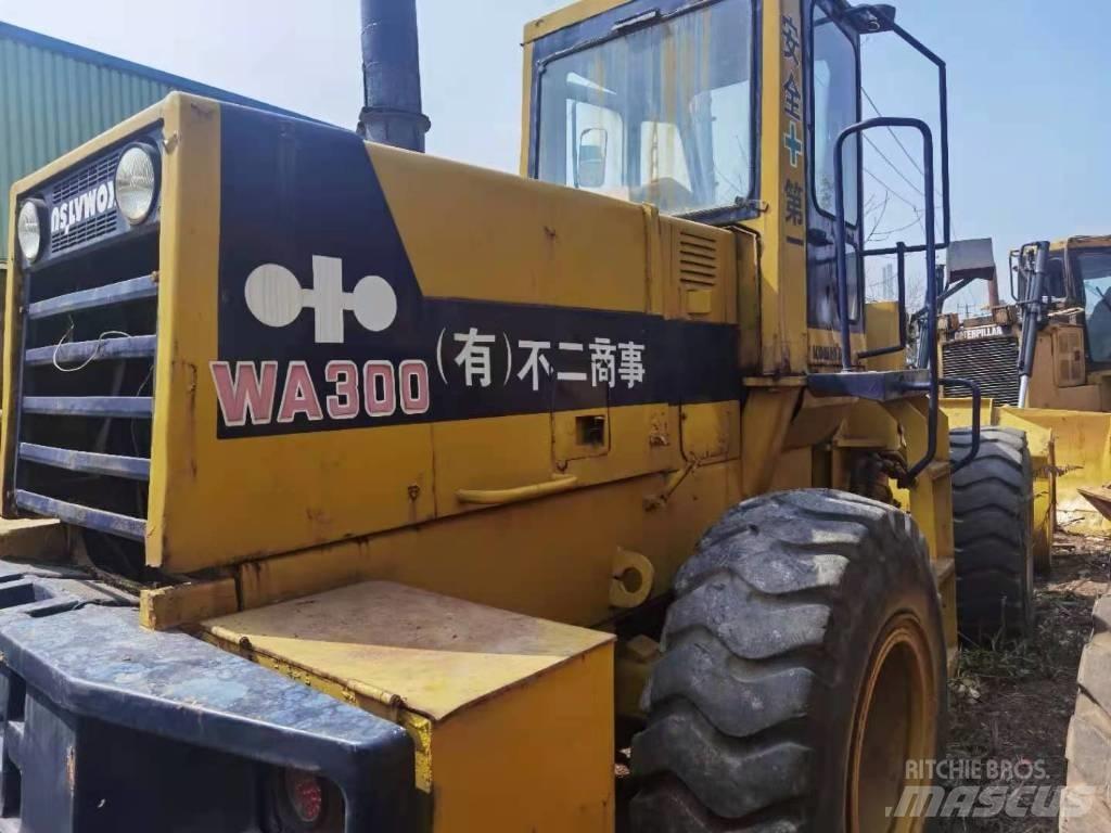 Komatsu WA 300 Kolesové nakladače