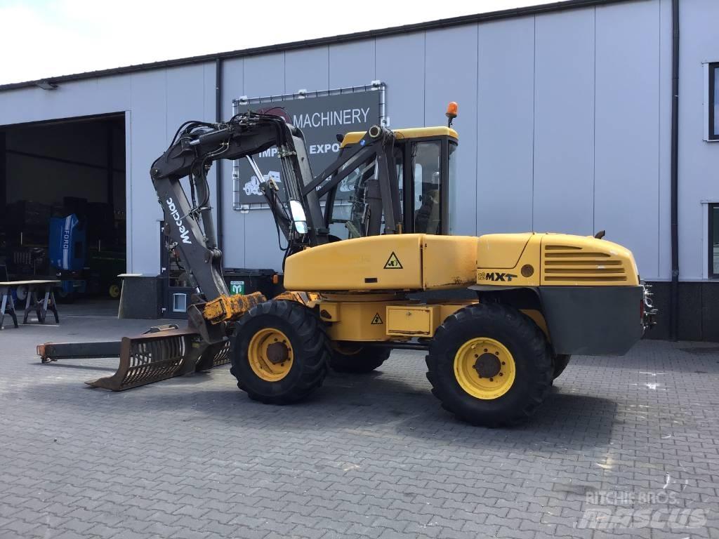 Mecalac 12 MXT Kolesové rýpadlá