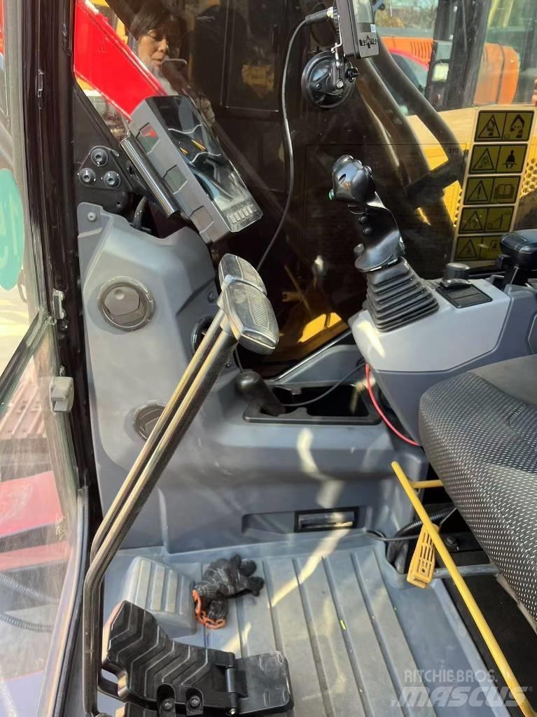 CAT 310 Pásové rýpadlá
