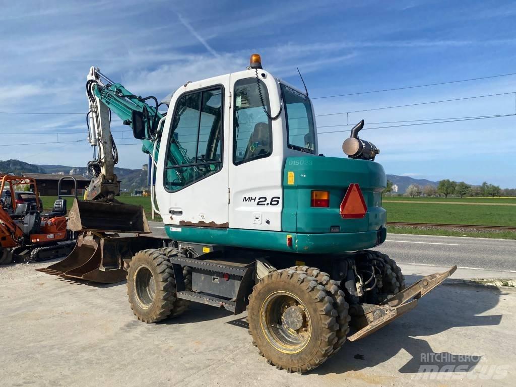 New Holland MH 2.6 Kolesové rýpadlá