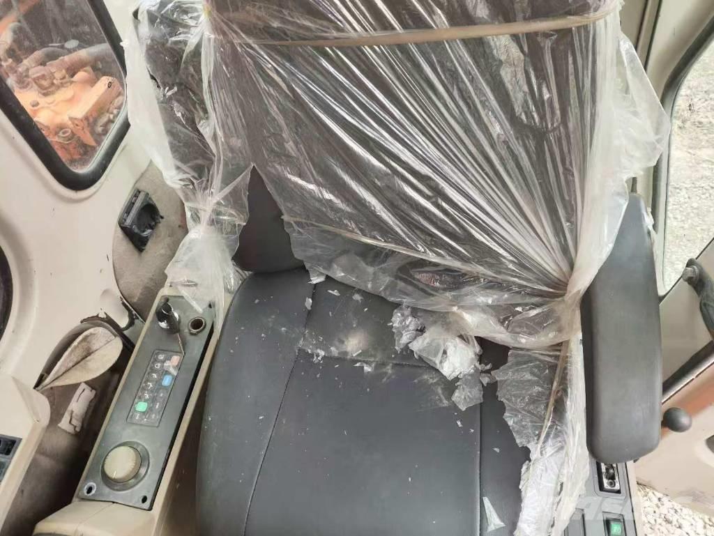 Doosan DH 210 W-7 Kolesové rýpadlá