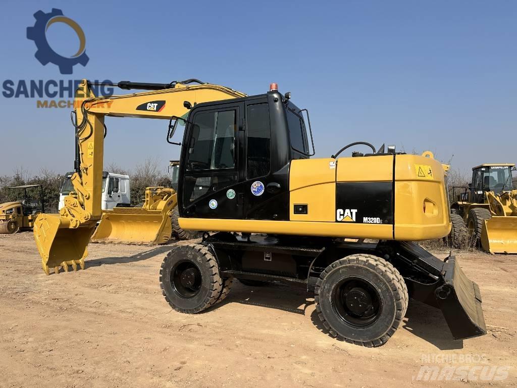 CAT M 320 D Kolesové rýpadlá