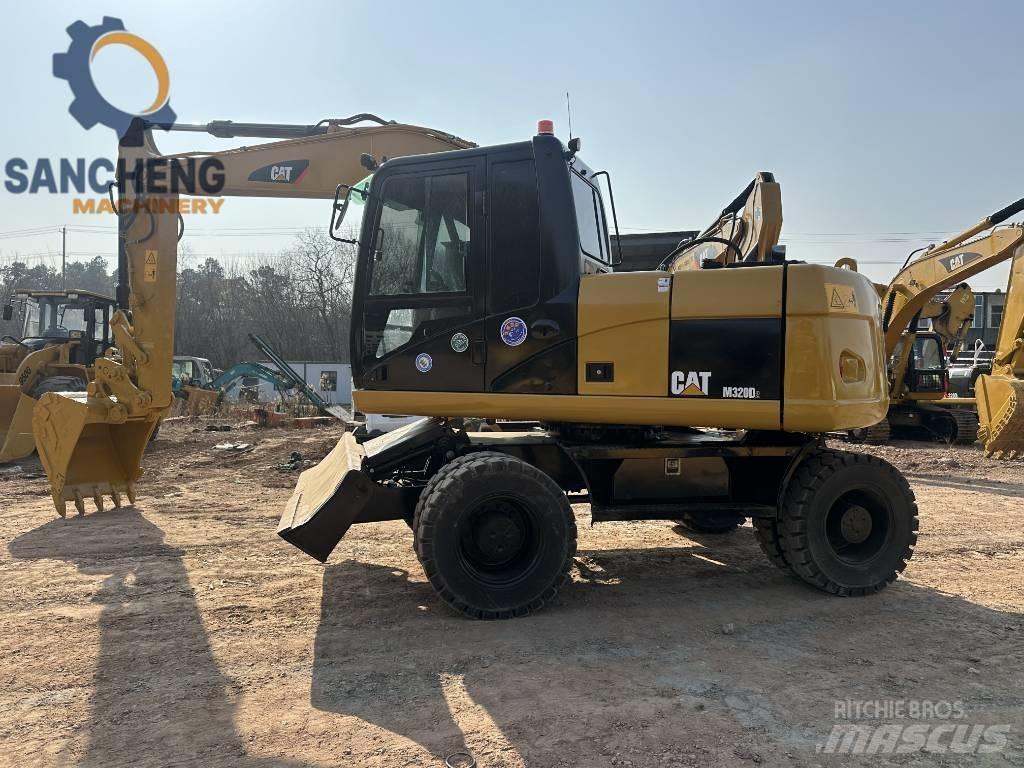 CAT M 320 D Kolesové rýpadlá