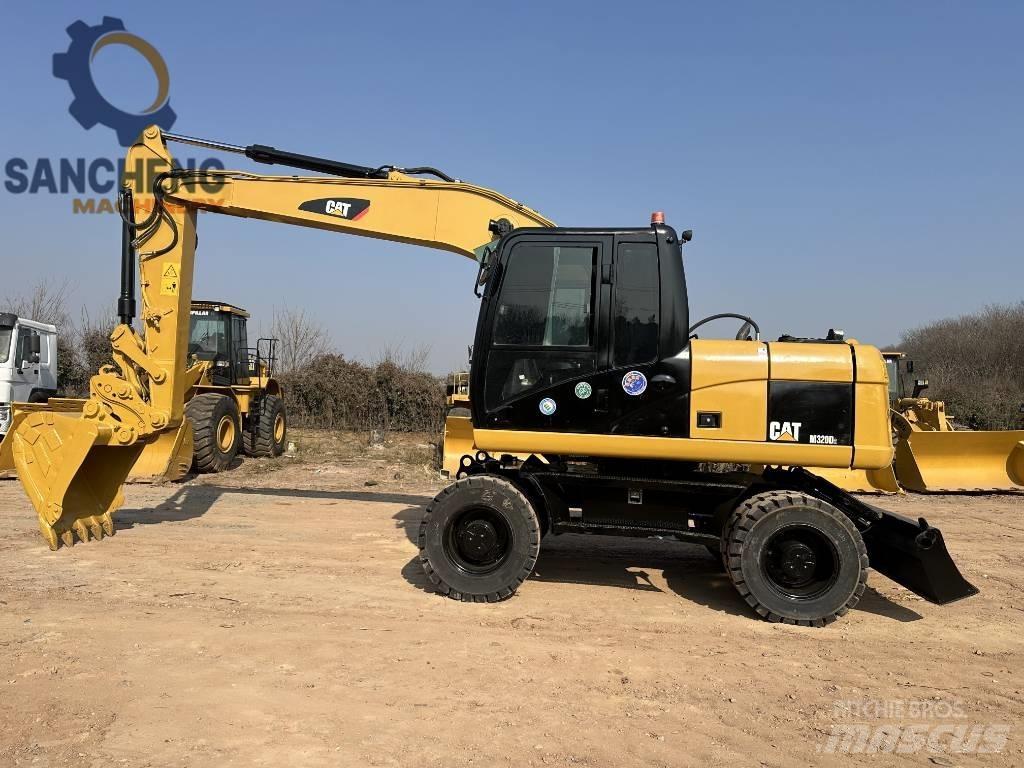 CAT M 320 D Kolesové rýpadlá