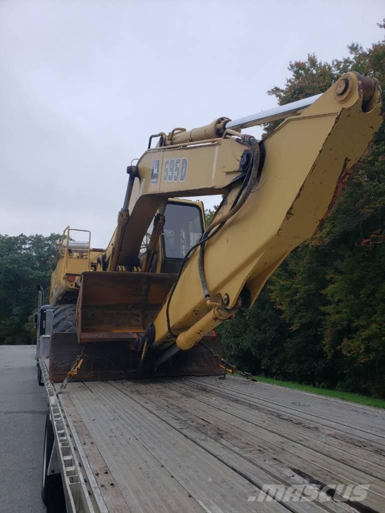 John Deere 595D Kolesové rýpadlá