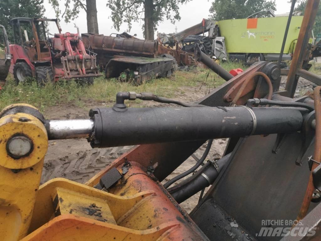 CAT 908H 2011r Kolesové nakladače