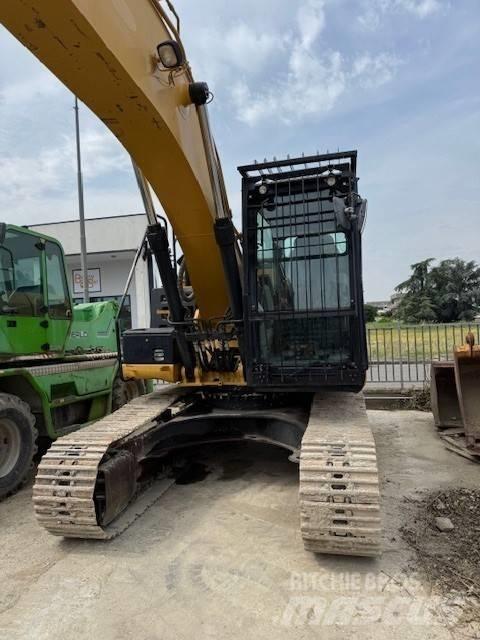 CAT 323 E Pásové rýpadlá