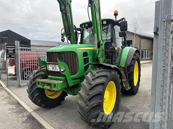John Deere 6530 Traktory