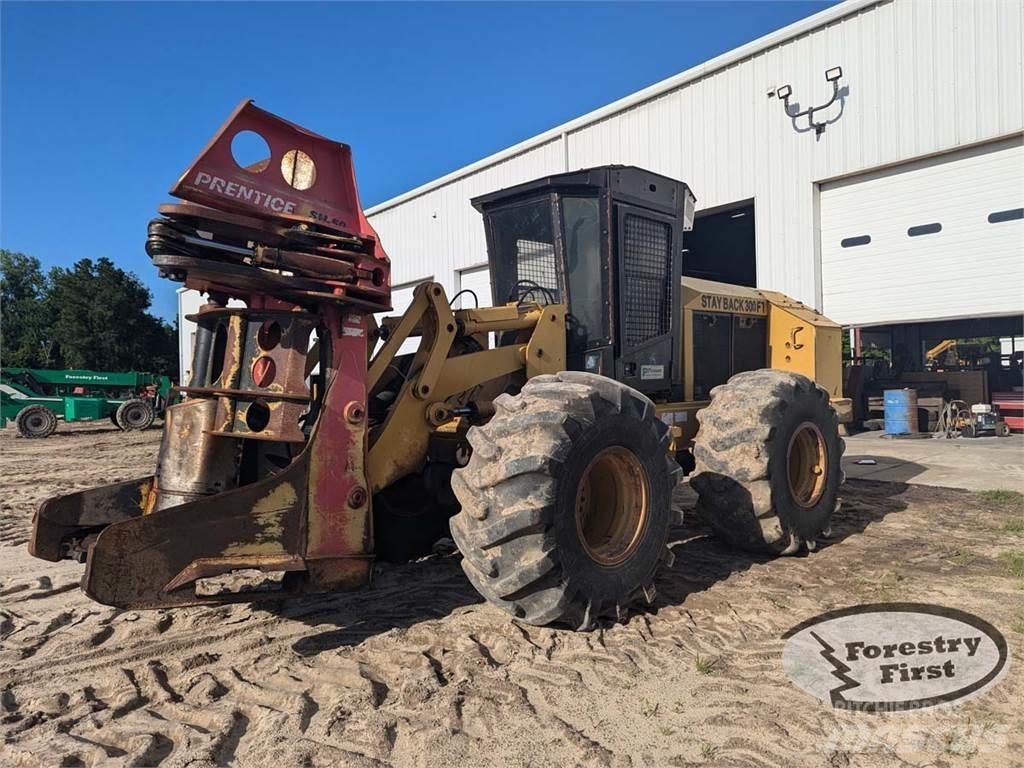 CAT 553 Stínacie harvestory