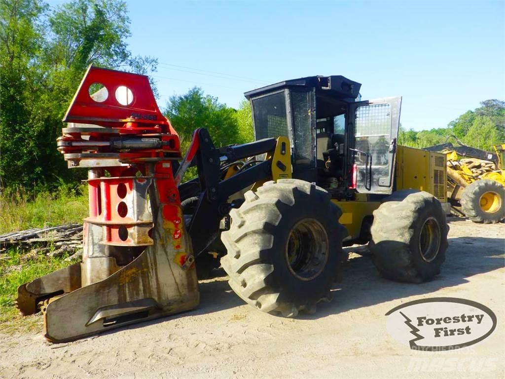CAT 553C Stínacie harvestory