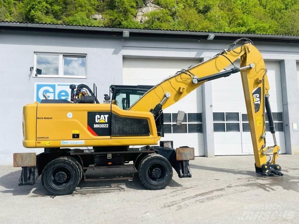 CAT MH3022 Stroje pre manipuláciu s odpadom