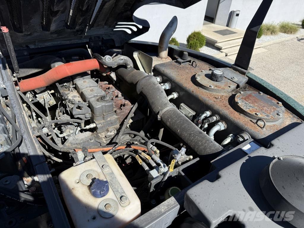 New Holland MH-Plus Kolesové rýpadlá