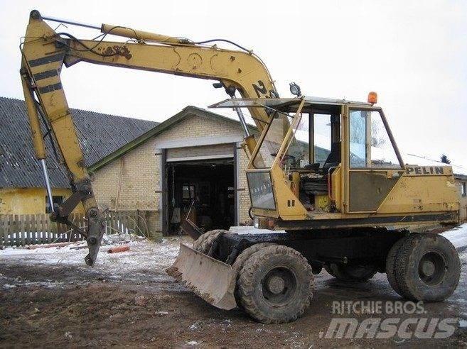 CAT 212 til ophug Pásové rýpadlá