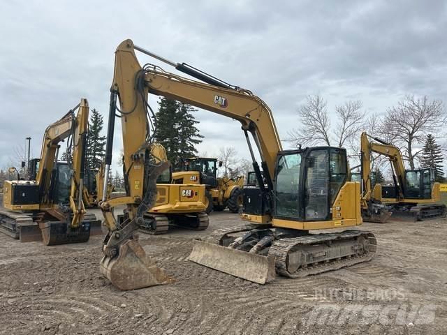 CAT 310 Pásové rýpadlá