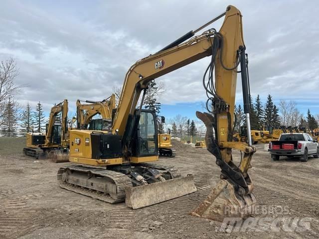 CAT 310 Pásové rýpadlá