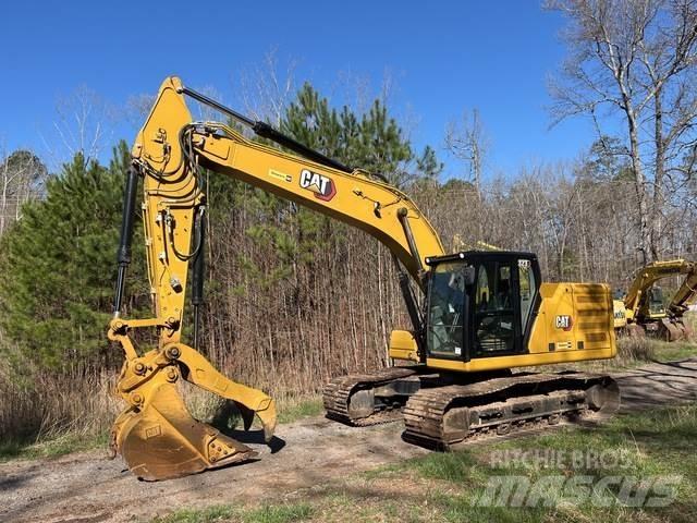 CAT 323 Pásové rýpadlá