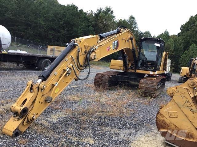 CAT 323 Pásové rýpadlá