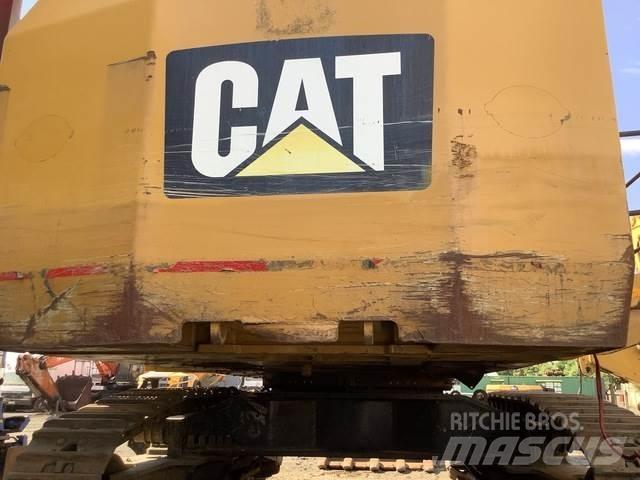 CAT 6015B Pásové rýpadlá