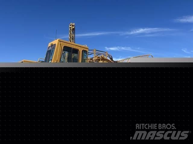 CAT 633E Skrejpre