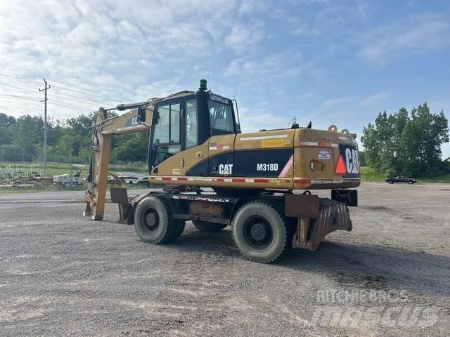 CAT M318D Kolesové rýpadlá
