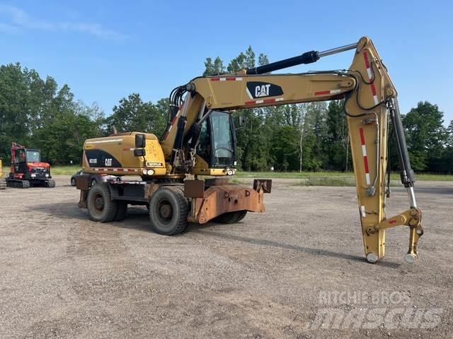 CAT M318D Kolesové rýpadlá