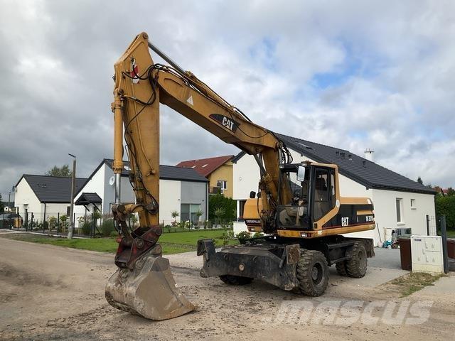 CAT M320 Kolesové rýpadlá