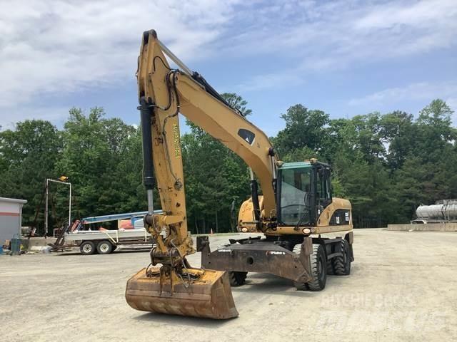CAT M322D Kolesové rýpadlá
