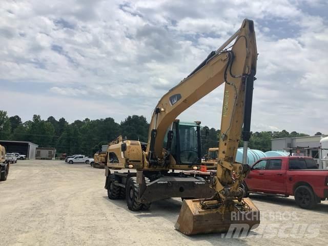 CAT M322D Kolesové rýpadlá