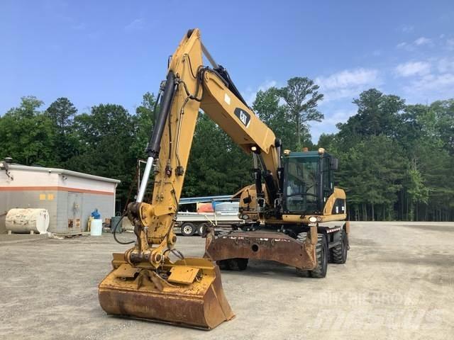 CAT M322D Kolesové rýpadlá