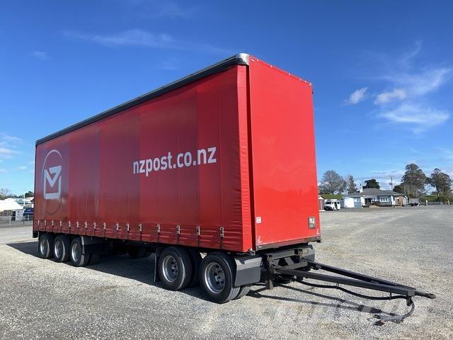 Fruehauf  Prívesy s bočnou zhrnovacou plachtou