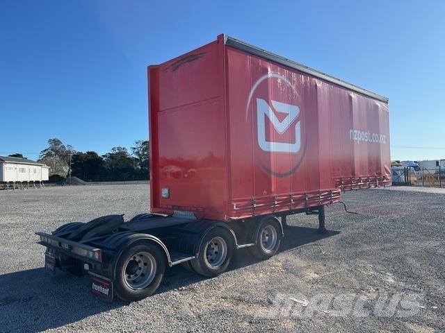 Fruehauf  Prívesy s bočnou zhrnovacou plachtou