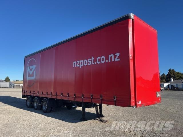 Fruehauf  Prívesy s bočnou zhrnovacou plachtou