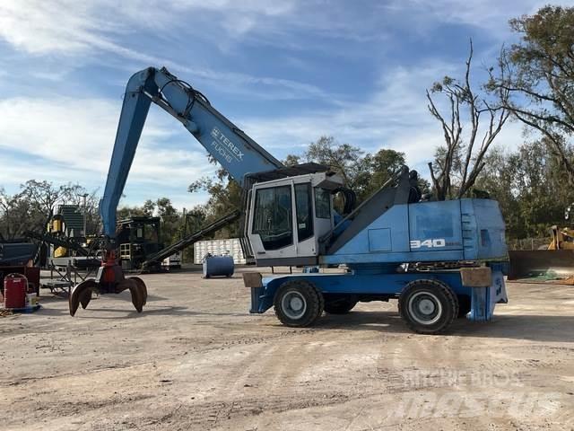 Fuchs MHL340 Stroje pre manipuláciu s odpadom